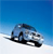 Pixelated image of a blue and white vehicle on a white surface under a blue sky background.