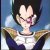 Pixelated image of a character with spiky black hair, closed eyes, and a white and blue outfit with gold shoulder accents.