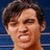 A pixelated image shows a person with short dark hair against a blue background, next to large black text reading "GRR!" on white.