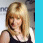 A pixelated image of a blonde woman in three side-by-side with blue borders, each showing slight variations in her pose and expression