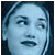 Pixelated image of a person with light skin tone and dark hair, side profile facing left on blue background; adjacent green text reads Original Icons .com.