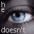 A pixelated close-up of a blue eye with text reading 'he doesn't care' in white block letters.