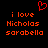 Red pixelated text on black background reads 'i love Nicholas sorabella' with a red heart symbol above the left side of the text.