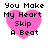 Four identical pixelated pink heart icons with black text reading "You Make My Heart Skip A Beat" arranged in a on white background