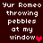 Pixelated text reads 'Yur Romeo throwing pebbles at my window' with a red heart symbol on dark brown background.