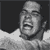 A grayscale image of a person with mouth open in laughter, next to multiple circular icons containing text (GI) on dark backgrounds.