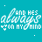 A static image with a teal background featuring repeated white text and symbols in a pattern