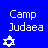 Blue background with white pixelated text reading 'Camp Judaea' and a Star of David symbol below the text.