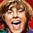 A pixelated image of a person with light brown hair and an open mouth, next to text reading "Zac Efron is Hot!" on black background.