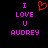 Pixelated text reads 'I LOVE U AUDREY' in pink with a red heart symbol above the word 'LOVE', displayed on black background.