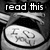 Black-and-white pixelated image with 'read this' text above a circular object containing indistinct symbols.
