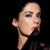 A pixelated contact sheet showing two frames of an animated icon featuring a woman's face on the left and green text reading "Original Icons .com" on the right against a dark background.