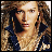A pixelated image of a person with curly hair and a dark jacket, next to a white square with yellow and black borders containing the letters 'jb' in blue, orange, and black.