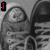 A black-and-white image of a shoe with pink text and symbols, transitioning to a full-color version showing the same shoe with additional pink elements.