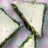 A static image shows four food items on a pink checkered background with "NANCY DREW" text in the bottom right corner.