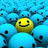 A yellow smiley face icon surrounded by blue pixelated figures with black dot eyes and mouths, arranged in a dense pattern.