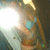 Animated icon shows a figure with light blue hair and brown clothing against a dark background with bright light effects.