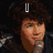 Six display a person with curly brown hair in various poses and backgrounds, each overlaid with text labels