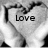 A grayscale heart-shaped icon with the word 'Love' centered inside, rendered in pixelated style.