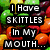 Pixelated text overlays split across two color-blocked sections with rainbow and fruit imagery in the background.