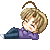 Pixel art character with blonde hair in a high ponytail, wearing purple top and dark blue pants, lying on side with one leg bent and one leg extended, head resting on hand.