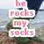 A pixelated image of a person's legs walking on a beach with overlaid pink text reading "he rocks my socks but kayla makes me smell them! <333".