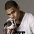 A person in a white shirt holds a small dog against a gray background with text reading 'Two cute dogs =]' on the right.