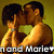 Two shirtless men kiss against a yellow background with partial text reading 'n and Mariet' at the bottom.