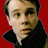 A pixelated buddy icon featuring a person on the left and bold text 'HELL BOY 4.2.04' on the right against a red background.