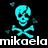 Pixelated cyan skull and crossbones with floating heart fragments on black background, featuring white text 'mikaela' below.