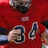 Red background with pixelated football player image and text overlays including "DUBE#84 DT/OG" and "we fight together we die together BOW football".