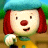 Pixelated cartoon character with red hair, blue hat, and yellow outfit against green background.