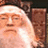 Pixelated image of a bearded man with long hair, split into four quadrants with text overlays on brown and gray backgrounds.