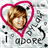 Pixelated icon with a pink heart outline surrounding a person's face, set against a light gray background with black text reading "i adore" below.