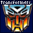 Pixelated Transformers logo with blue background and orange-yellow face, text "transformers" above and "robots in disguise" below.