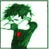 Pixelated cartoon character with spiky green hair, closed eyes, and a red chest emblem on a white background.