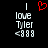 A black background displays two identical pixelated text blocks with a red heart symbol above the left block, each reading 'I love Tyler <333' in white and gray pixels.