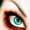 Close-up of a human eye with teal-colored iris, red and black eyeshadow, and long dark eyelashes, set against light skin with a visible eyebrow.