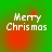 Green background with red circular gradients and white pixelated text reading 'Merry Christmas' in two lines.