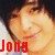 four shows a person with dark hair and light skin smiling, with red text overlays in the bottom-left and bottom-right