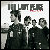 Four pixelated figures in dark clothing stand side-by-side beneath large pixelated text with red accents on a light background.