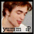 Pixelated image of a person with brown hair wearing a white shirt, showing partial face and shoulder against light background.