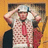 Pixelated image of a person in a patterned shirt and red tie adjusting a cap, with orange background text reading "Thomas" and "Delonge".