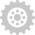 A static grayscale icon with a central circular pattern surrounded by eight gear-like protrusions on a light gray background.