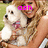 A pixelated image shows a person holding a small white dog with brown patches, wearing pink text 'osh' above the head.