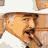 A 2x2 contact sheet of four animated frames showing a cartoon character in different hats and expressions, with one frame containing repeated text.