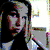 A static image of a person with long dark hair in three distinct visual styles: realistic, blue-toned, and rainbow-colored pixel art.