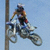 A pixelated animated contact sheet showing a dirt bike rider mid-air on the left and bold red text 'GOT DIRT?' on the right, with two sampled frames visible in a 2x1 layout.