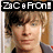 Pixelated image of a person with light brown hair and blue eyes, wearing dark clothing under a black banner reading 'Zac Efron!' in white block letters.