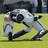 A pixelated image shows a marching band member in motion on the left, with green background text reading "Marching Band... The real game begins when halftime starts.".